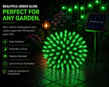 Solar powered green LED garden light with text highlighting features on a dark background.