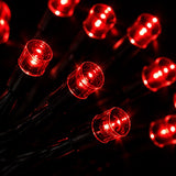 Close-up of red LED lights on a black background