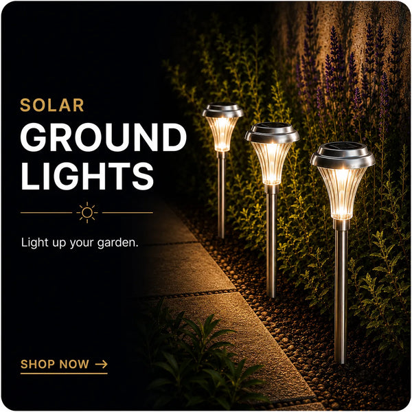 Solar ground lights illuminating a garden pathway.